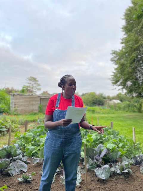 JC performs poetry at the allotment.