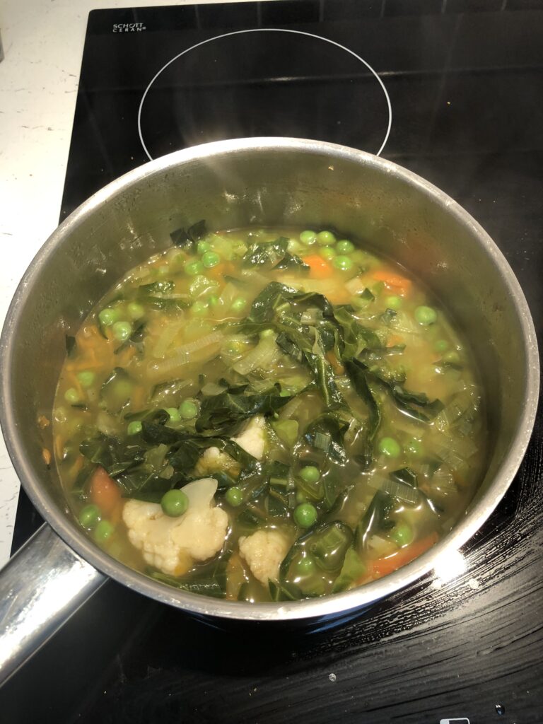 Soup in a pot.