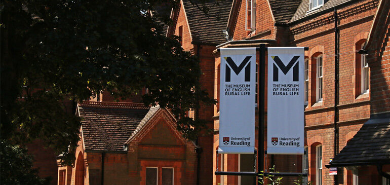 Banners with the MERL logo in front of a Victorian brick building, East Thorpe