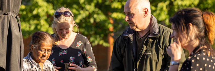 Community members in The MERL garden.