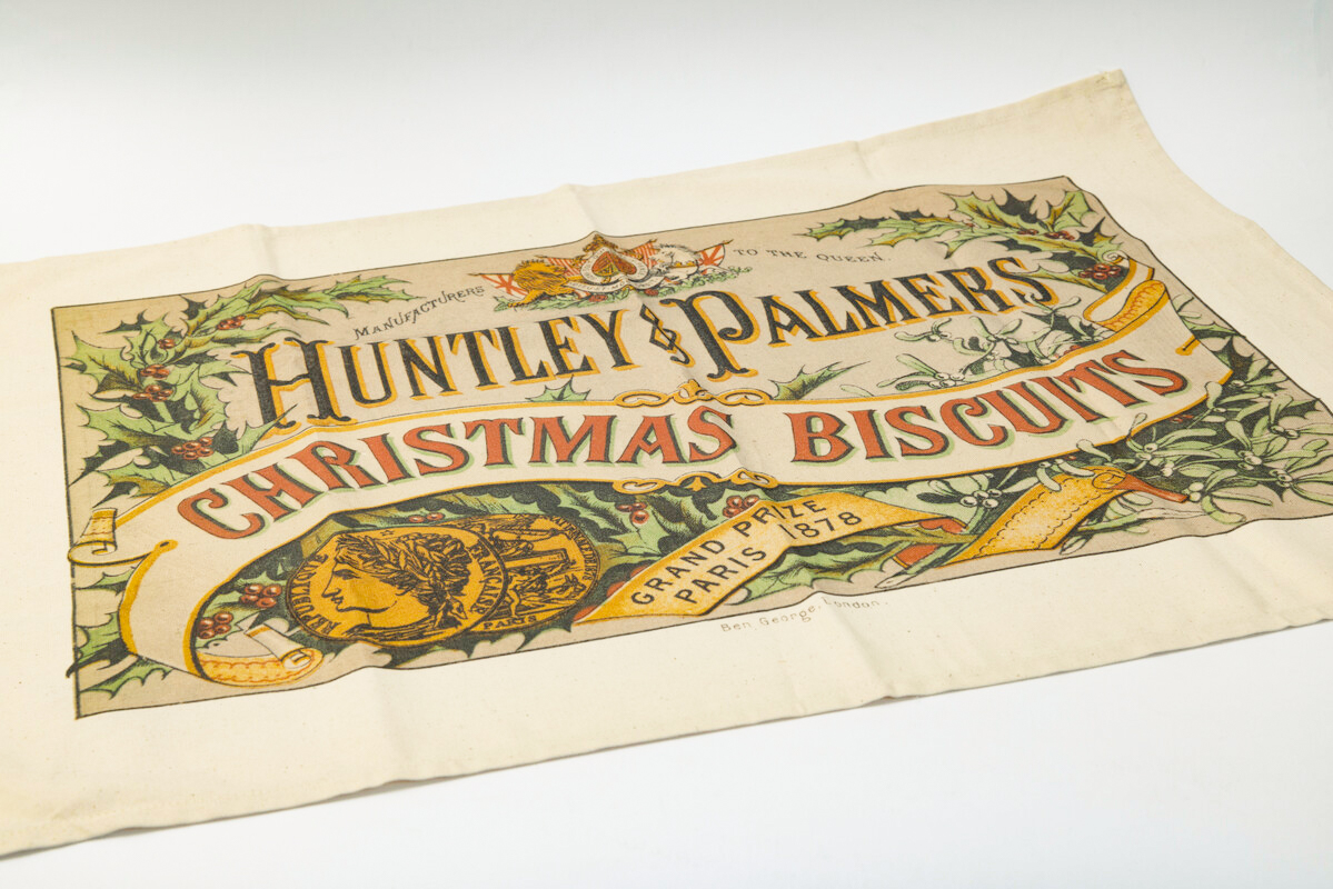 A tea towel featuring Huntley & Palmers' Christmas biscuits.