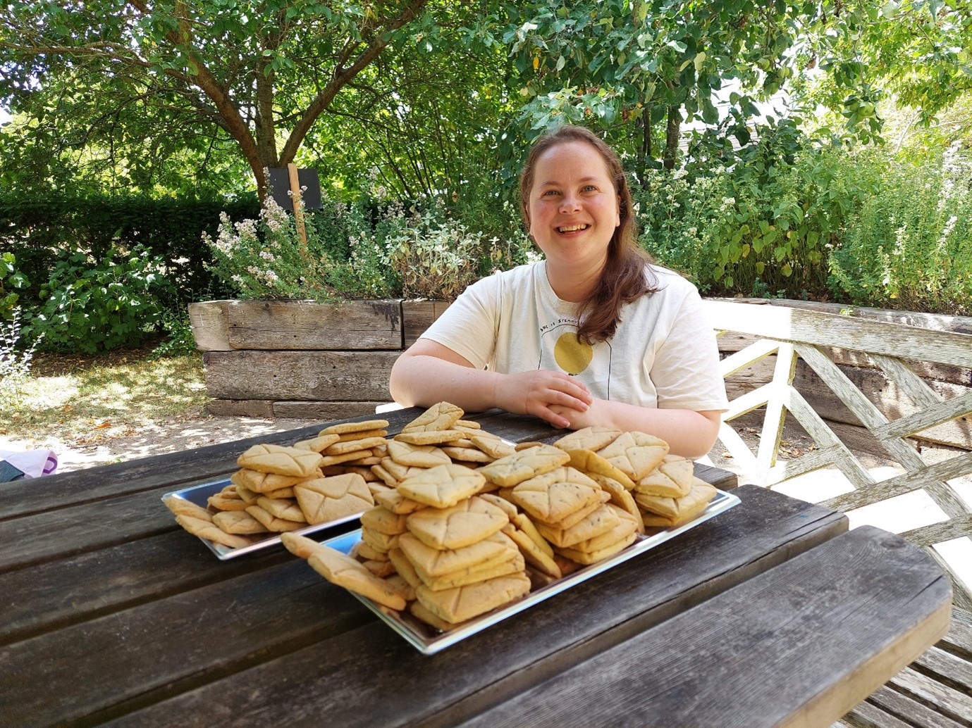 The Special Collections' Modernist Archives Publishing Project Archivist hosted an in-person gathering with 100 envelope-shaped biscuits to celebrate volunteers' transcription of 100 different letters!