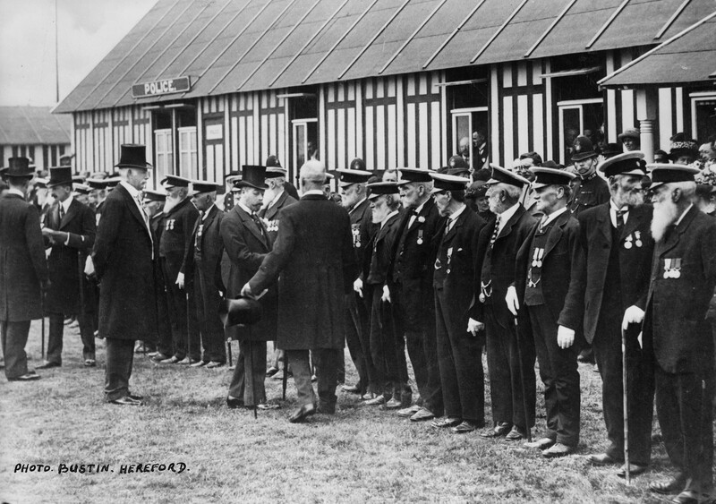 Black and white photograph of King George V (centre) inspecting veterans at the Royal Show, Bristol.