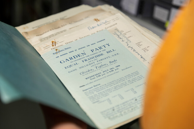 A blue invitation to Nancy Astor MP, inviting her to join a party celebrating the Representation of the People Act 1928