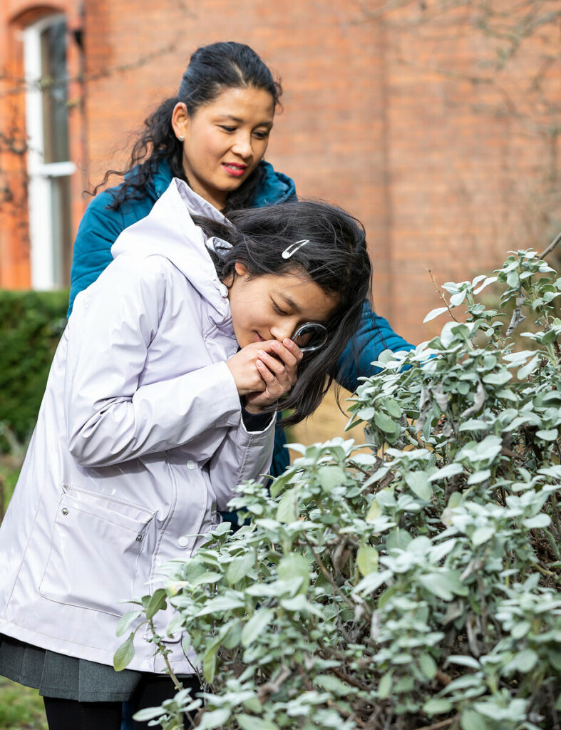 school girl explores the MERL garden as part of a Land Use workshop