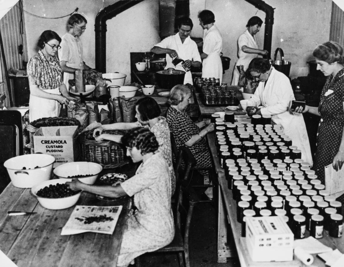 Black and white photograph of jam distribution