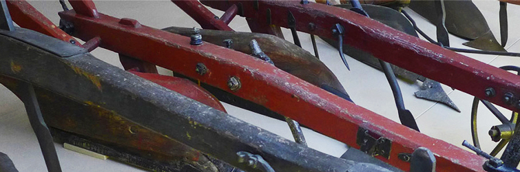 Detail of ploughs in the Digging Deeper gallery at The MERL