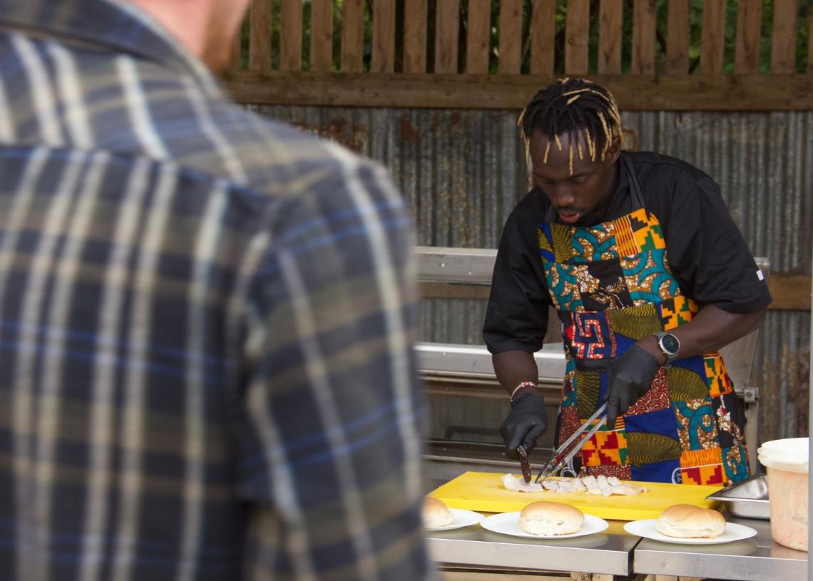 Flavian preparing meat for burgers